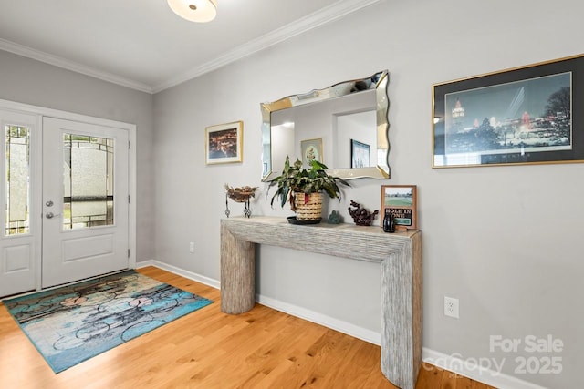 219 Broadleaf Dr, Denver, NC 28037 - entryway with light wood-type flooring, ornamental molding, and baseboards