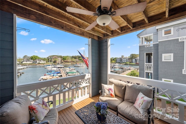 18679 Vineyard Point Ln, Cornelius, NC 28031 - balcony featuring a water view, ceiling fan, and an outdoor hangout area