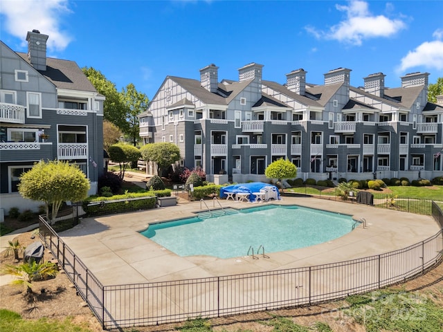 18679 Vineyard Point Ln, Cornelius, NC 28031 - community pool featuring a patio area