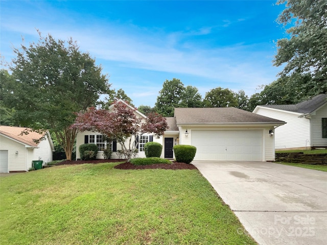 12307 Poplar Forest Dr, Charlotte, NC 28278 - view of front of house with a garage, concrete driveway, and a front yard