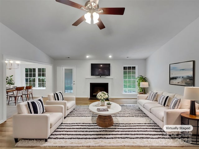 12307 Poplar Forest Dr, Charlotte, NC 28278 - living room with recessed lighting, wood finished floors, a fireplace, a ceiling fan, and lofted ceiling