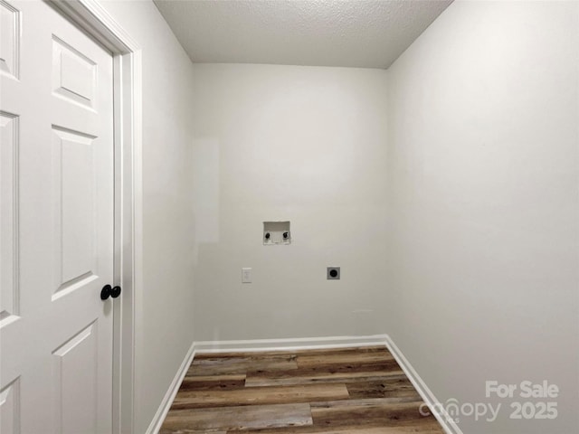 12307 Poplar Forest Dr, Charlotte, NC 28278 - laundry area with hookup for an electric dryer, wood finished floors, washer hookup, a textured ceiling, and baseboards