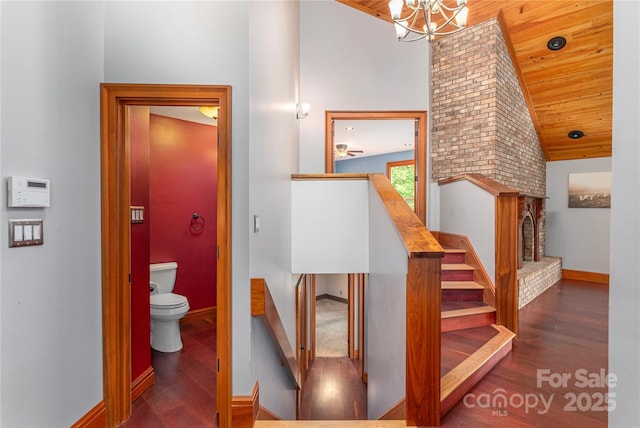 1227 Brush Creek Cir, Fairview, NC 28730 - stairs with high vaulted ceiling, wood ceiling, a chandelier, and wood finished floors