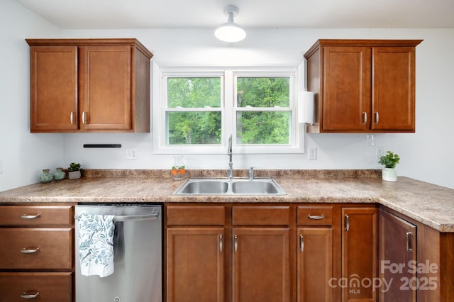 205 Cowan Cove Rd, Asheville, NC 28806 - kitchen with dishwasher, a sink, and brown cabinets