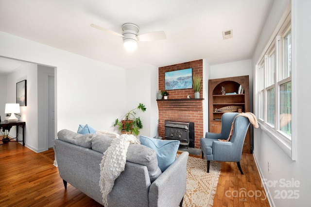 205 Cowan Cove Rd, Asheville, NC 28806 - living area featuring baseboards, wood finished floors, and a ceiling fan