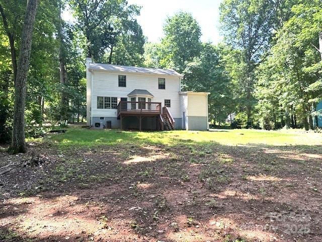 14027 Hackamore Dr, Matthews, NC 28105 - back of property with a wooden deck and stairs