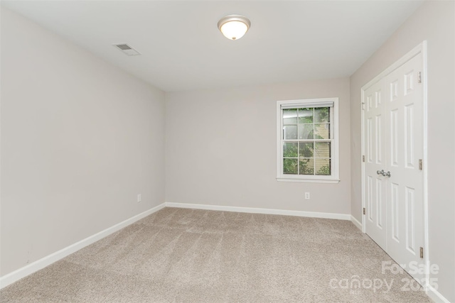 14027 Hackamore Dr, Matthews, NC 28105 - unfurnished bedroom featuring baseboards and light colored carpet