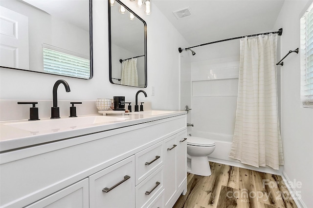 117 Autumn Woods Dr, Kings Mountain, NC 28086 - full bath with double vanity, shower / bath combo, and wood finished floors