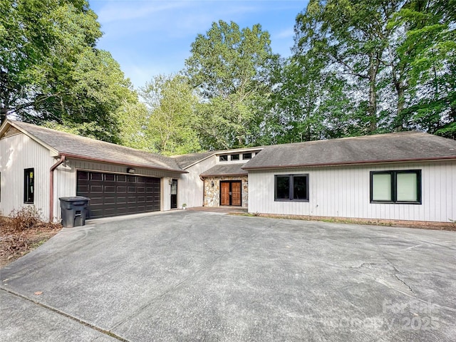 1700 Abbottsford Dr, Kernersville, NC 27284 - view of front of property with driveway, an attached garage, and roof with shingles