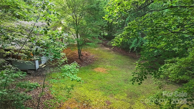 1700 Abbottsford Dr, Kernersville, NC 27284 - view of yard with a wooded view