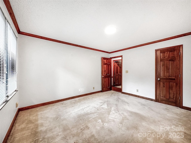 1700 Abbottsford Dr, Kernersville, NC 27284 - carpeted spare room with baseboards and ornamental molding