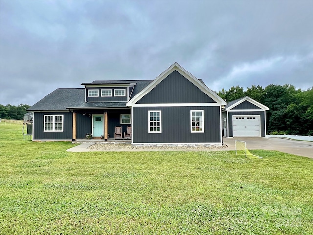 7133 Church Rd, Taylorsville, NC 28681 - view of front of property featuring driveway, a garage, a front yard, and covered porch