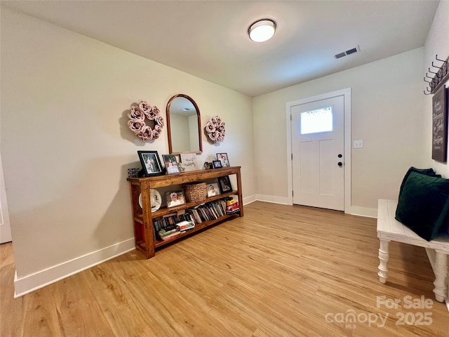 7133 Church Rd, Taylorsville, NC 28681 - foyer featuring light wood-style floors and baseboards