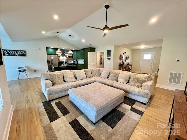 7133 Church Rd, Taylorsville, NC 28681 - living area with vaulted ceiling, light wood-style floors, baseboards, a ceiling fan, and recessed lighting