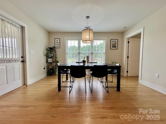 7133 Church Rd, Taylorsville, NC 28681 - dining room featuring light wood-style floors and baseboards