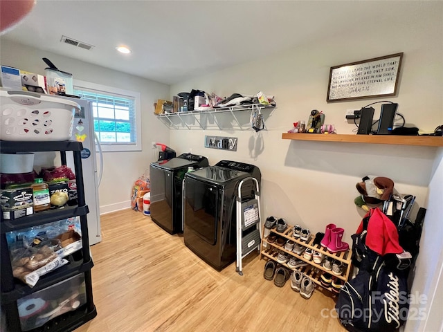 7133 Church Rd, Taylorsville, NC 28681 - laundry room featuring washing machine and dryer, wood finished floors, recessed lighting, and baseboards