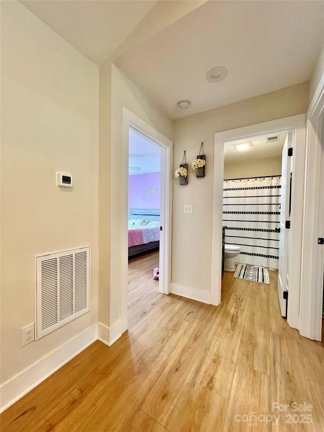 7133 Church Rd, Taylorsville, NC 28681 - hall with light wood finished floors and baseboards