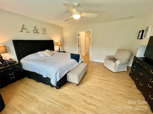 7133 Church Rd, Taylorsville, NC 28681 - bedroom with light wood finished floors, baseboards, and a ceiling fan