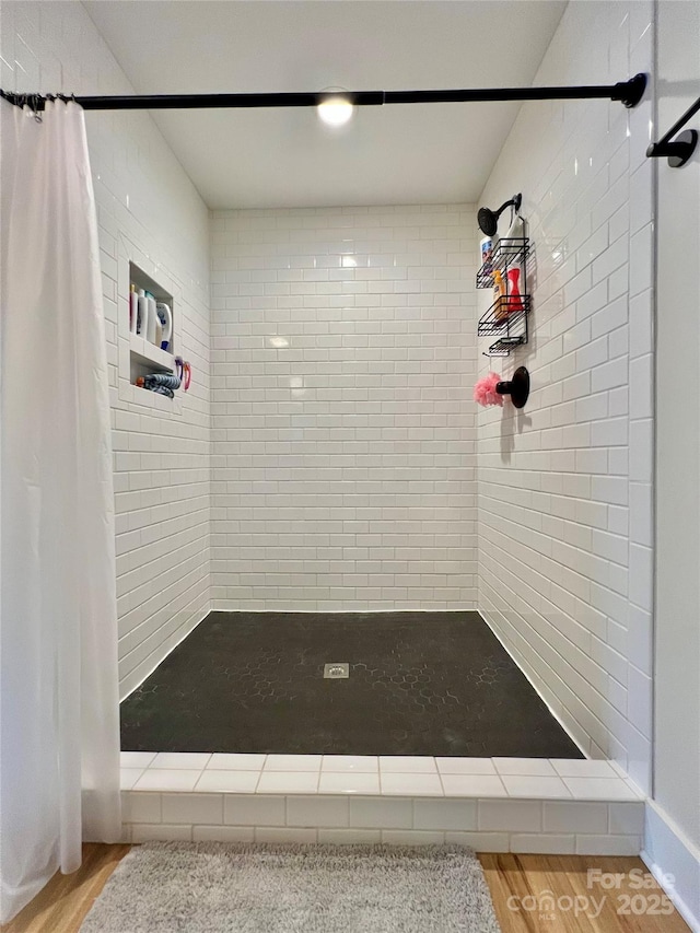 7133 Church Rd, Taylorsville, NC 28681 - full bathroom with wood finished floors and tiled shower