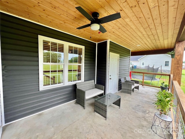 7133 Church Rd, Taylorsville, NC 28681 - view of patio featuring a trampoline and ceiling fan