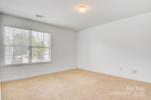 5311 Oakdale Ridge Rd, Charlotte, NC 28216 - carpeted spare room with healthy amount of natural light and baseboards