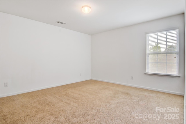 5311 Oakdale Ridge Rd, Charlotte, NC 28216 - carpeted spare room featuring baseboards