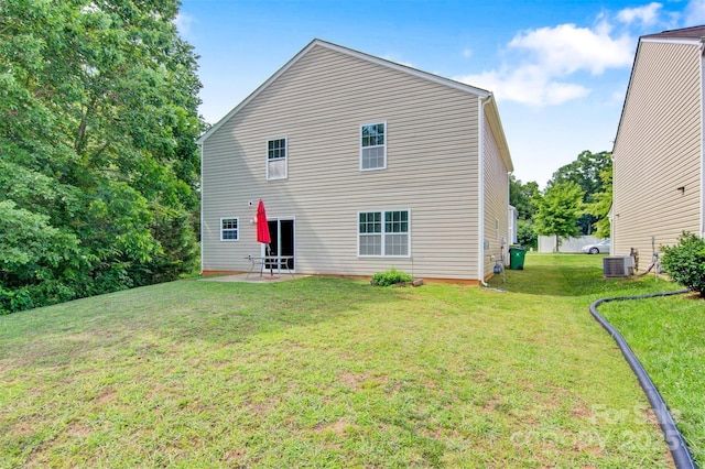 5311 Oakdale Ridge Rd, Charlotte, NC 28216 - back of property with cooling unit, a patio area, and a yard