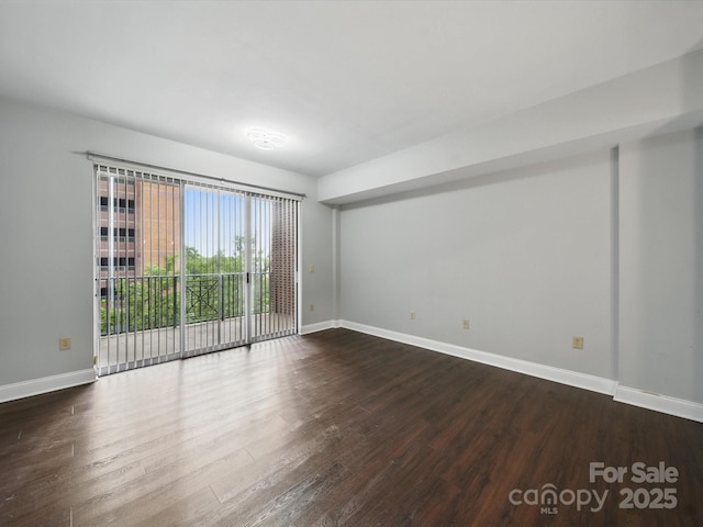 300 W 5th St Unit 339, Charlotte, NC 28202 - empty room with dark wood finished floors and baseboards