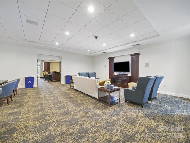 300 W 5th St Unit 339, Charlotte, NC 28202 - living room featuring carpet, baseboards, recessed lighting, and ornamental molding