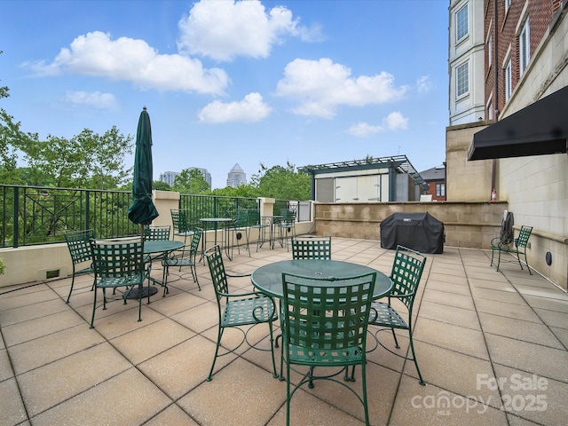 300 W 5th St Unit 339, Charlotte, NC 28202 - view of patio featuring area for grilling and outdoor dining space