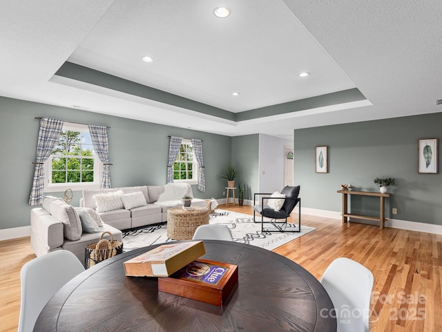 21 Kahluas Way, Fairview, NC 28730 - living area with a tray ceiling, light wood finished floors, and recessed lighting