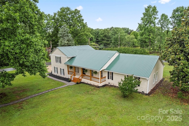 105 Pelican Ct, Mooresville, NC 28117 - view of front facade with a front yard, a porch, and metal roof
