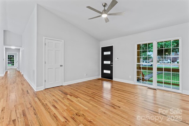 105 Pelican Ct, Mooresville, NC 28117 - entryway featuring light wood finished floors, plenty of natural light, a ceiling fan, high vaulted ceiling, and baseboards