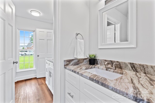105 Pelican Ct, Mooresville, NC 28117 - bathroom featuring vanity and wood finished floors