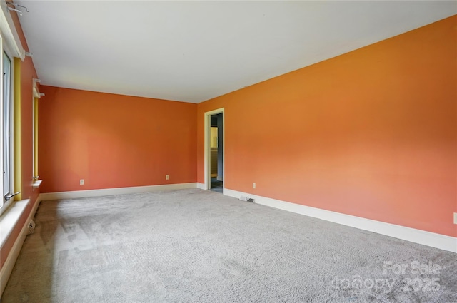 6900 Ridge Lane Rd, Charlotte, NC 28262 - empty room with baseboards and carpet