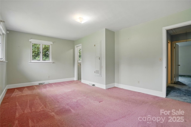6900 Ridge Lane Rd, Charlotte, NC 28262 - unfurnished room with attic access, carpet flooring, and baseboards