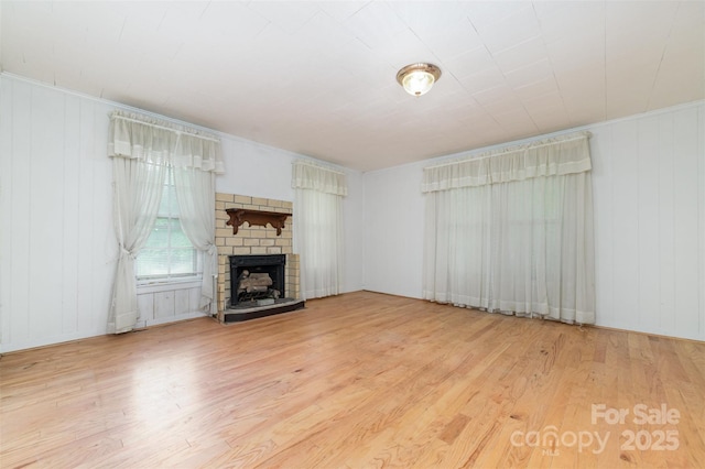 520 Eastwood Park Cir, Albemarle, NC 28001 - unfurnished living room featuring wood finished floors and a stone fireplace