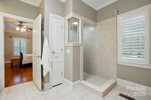 102 Rosewood Ln, Locust, NC 28097 - ensuite bathroom featuring crown molding, a walk in shower, a ceiling fan, tile patterned floors, and baseboards