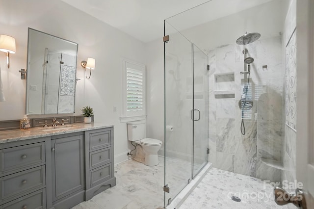 102 Rosewood Ln, Locust, NC 28097 - full bathroom featuring a stall shower, vanity, marble look tiles, toilet, and baseboards