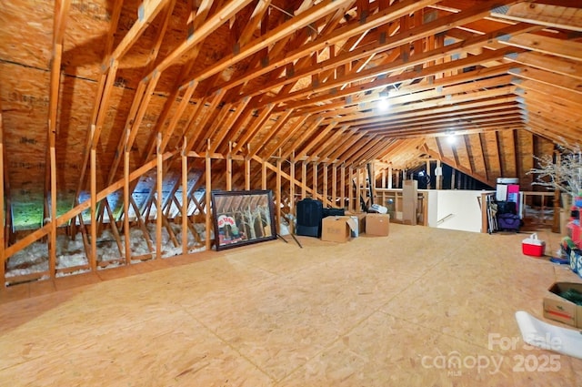 102 Rosewood Ln, Locust, NC 28097 - attic featuring an upstairs landing