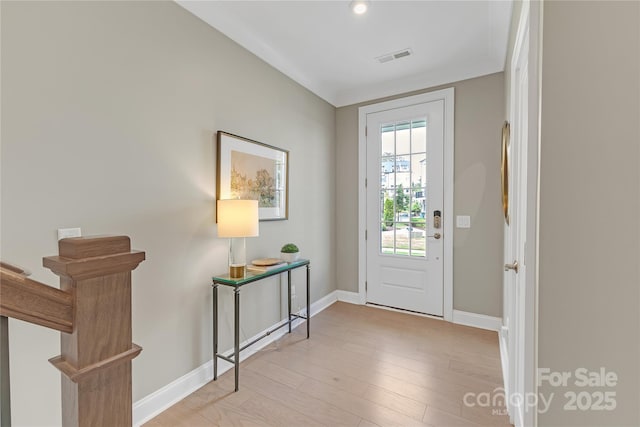 5060 Harrowsmith Ln, Charlotte, NC 28204 - entrance foyer with baseboards and light wood-style floors