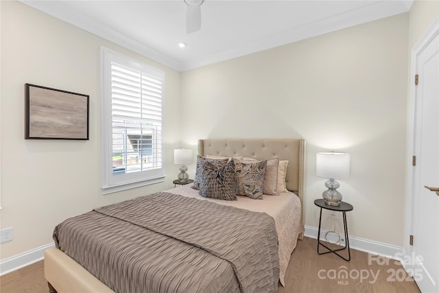 5060 Harrowsmith Ln, Charlotte, NC 28204 - bedroom with baseboards, wood finished floors, ceiling fan, and recessed lighting