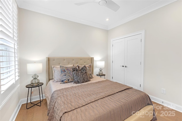 5060 Harrowsmith Ln, Charlotte, NC 28204 - bedroom with multiple windows, wood finished floors, baseboards, and recessed lighting