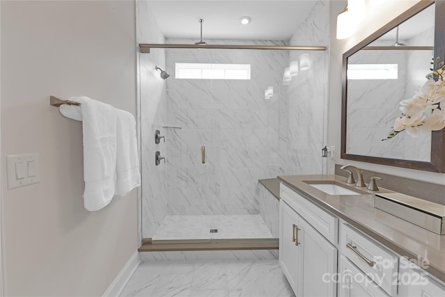 5060 Harrowsmith Ln, Charlotte, NC 28204 - bathroom with healthy amount of natural light, a marble finish shower, marble look tile flooring, and vanity