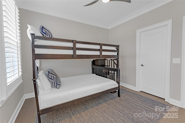 5060 Harrowsmith Ln, Charlotte, NC 28204 - bedroom featuring baseboards, wood finished floors, ceiling fan, and ornamental molding