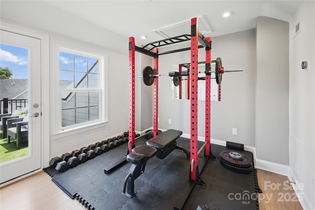 5060 Harrowsmith Ln, Charlotte, NC 28204 - exercise area featuring wood finished floors and baseboards
