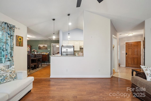 119 Ashwood Ln, Mooresville, NC 28117 - living room with a ceiling fan, wood finished floors, and lofted ceiling