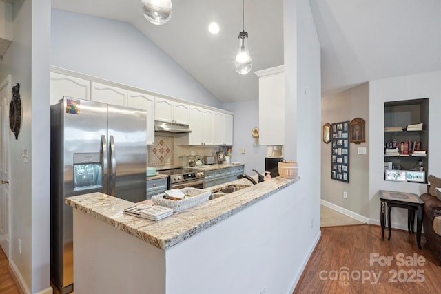 119 Ashwood Ln, Mooresville, NC 28117 - kitchen with appliances with stainless steel finishes, under cabinet range hood, white cabinetry, a peninsula, and wood finished floors