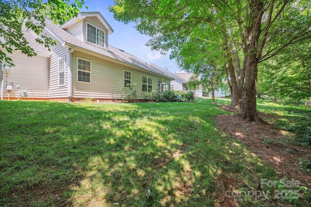 119 Ashwood Ln, Mooresville, NC 28117 - rear view of house featuring a lawn