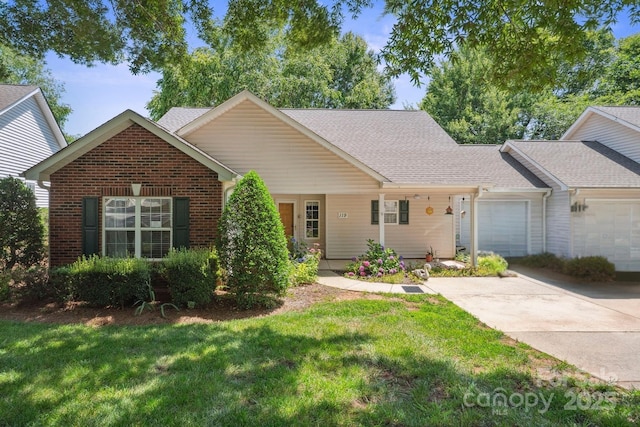 119 Ashwood Ln, Mooresville, NC 28117 - view of front of home with an attached garage, a front yard, driveway, and roof with shingles